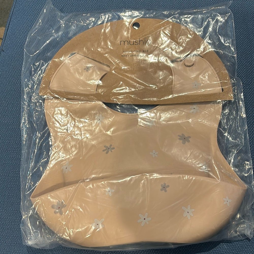 Brand new mushie silicon bib